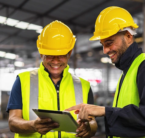 construction workers on an ipad
